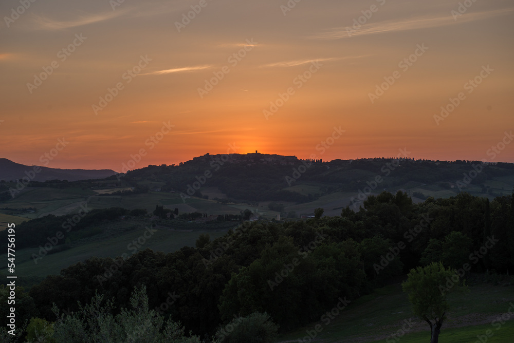 Sunset over the Tuscan countryside, Italy.