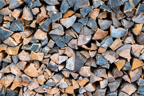 Stacked firewood in woodpile