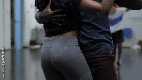 Dancers couple at Caribbean dance class
