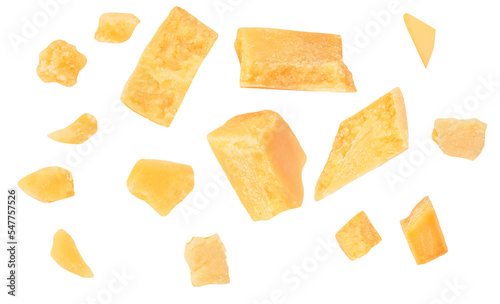 Pieces of parmesan cheese isolated on white background. Hard mature cheese Parmesan, Parmigiano in rough pieces top view, flat lay. Pattern.