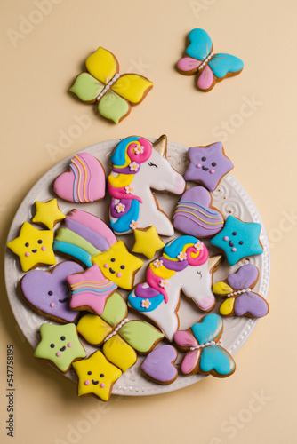 Ginger cookies of different shapes in colored glaze
