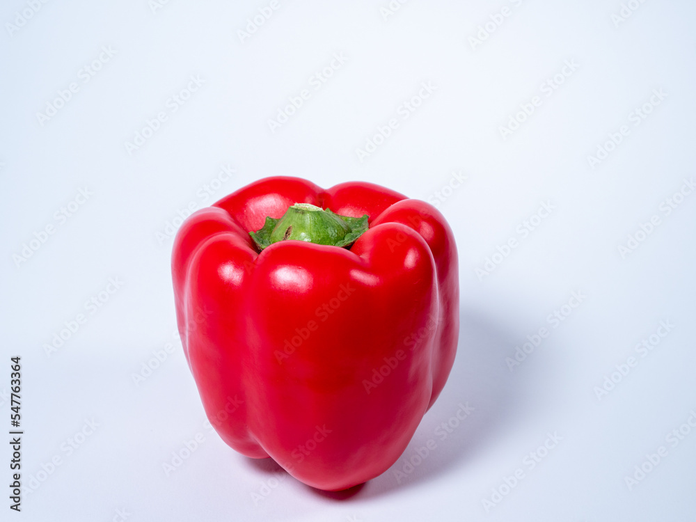 Red paprika on a white background. Red fresh pepper. Red paprika on a white background. Red fresh pepper.