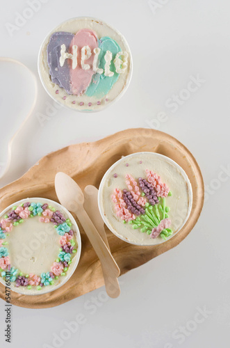 homemade cake to go in white disposable coffee cups, new confectionery trend, photo