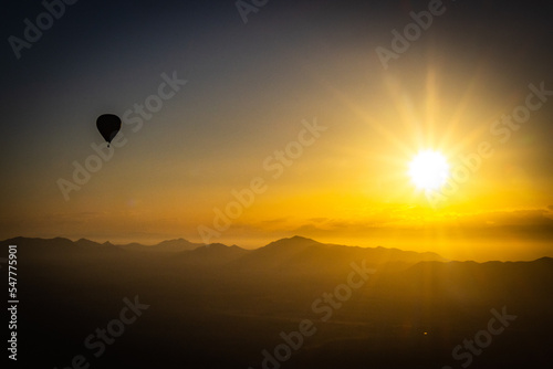hot air balloon over Marrakech, morocco, north africa, sunrise, high atlas mountains, adventure, starburst