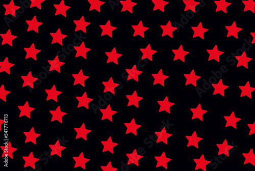 Repeating red stars isolated on black surface