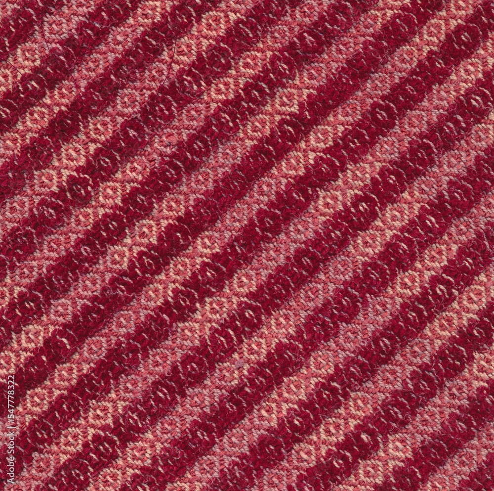 Striped handwoven towel in red colors.