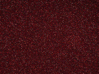 Dark Red glitter. Perfect holographic background or pattern of sparkling shiny glitter for decoration and design of Christmas, New Year, Valentine Day, 3d, xmas gift card or other holiday pictures.