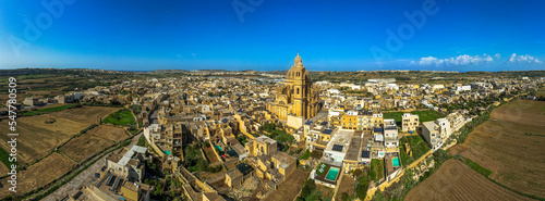Panoramic view of Rotunda St. John Baptist Church in the town of Xewkija, Gozo, Malta. Aerial drone view