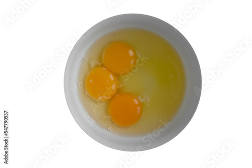 Raw eggs in a plate isolated on white background