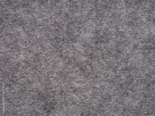Obraz na płótnie Soft grey felt. Surface of felted fabric texture abstract background in gray color. Pattern for text, lettering, patchworkor other art work. Full frame backdrop wallpaper. High resolution photo. w salonie