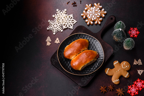 Sweet tasty fresh festive baking on a dark concrete background