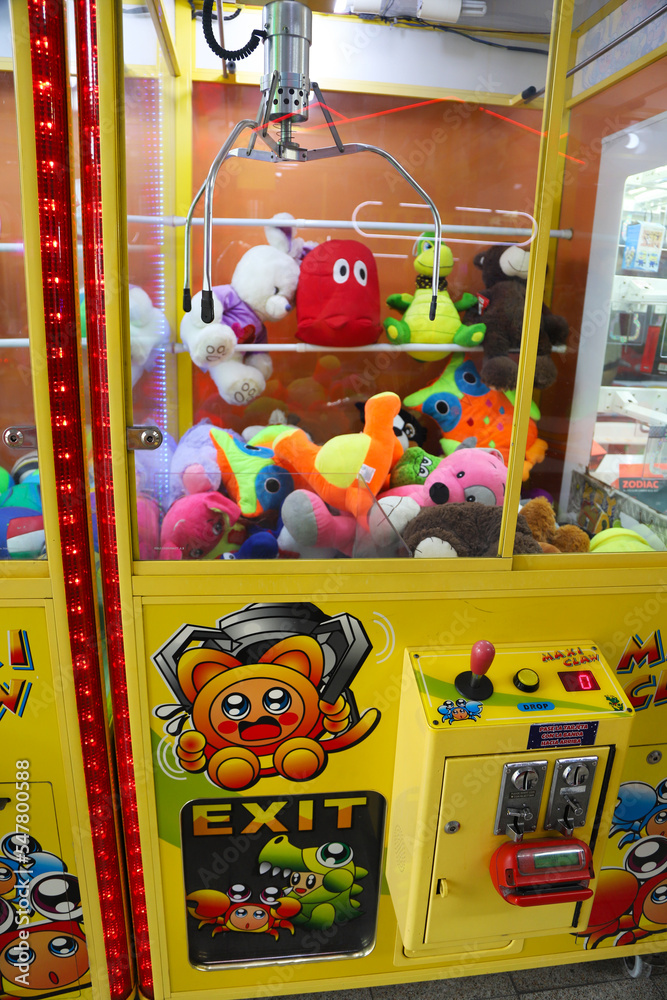Electronic claw machine to grab stuffed animals. Claw machine. Arcade ...