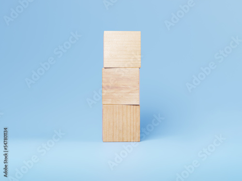 Fototapeta Naklejka Na Ścianę i Meble -  Stack of wood tile blocks in isolated blue background, 3d rendering. Mock-up for text, abbreviation and signs on timber cubes