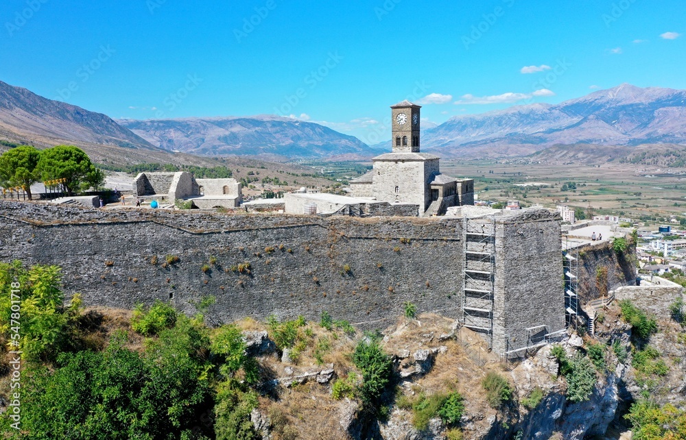 Fototapeta premium Gjirokaster Castle. Gjirokastra. Albania. View of the fortress from above. View of the city from above. White buildings in the center of the Gyrocastra. Drone shooting