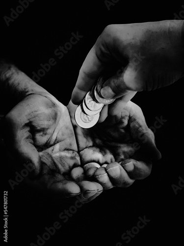 hands of the person in the act of helping fellow man