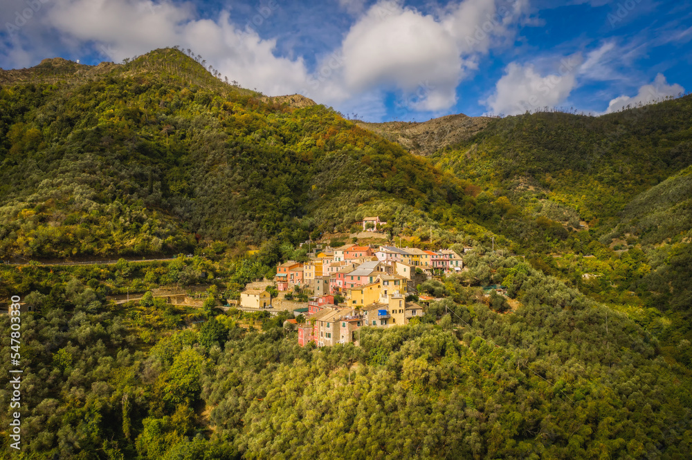 A small village Lizza high up in the mountains near Levanto on the Ligurian coast. Secluded and almost forgotten it looks at us. Hardly any tourist is lost there. Aerial drone picture. September 2021