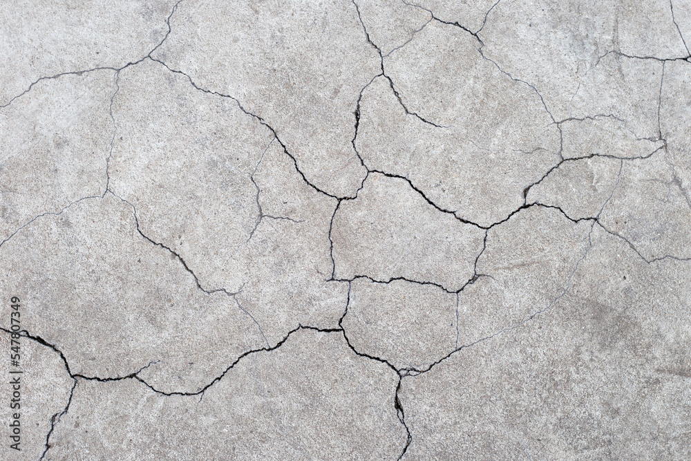 Obraz premium Cracked cement or concrete surface texture for background.
