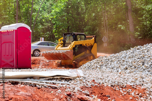During an bobcat mini loader transport crushed stone to various construction site