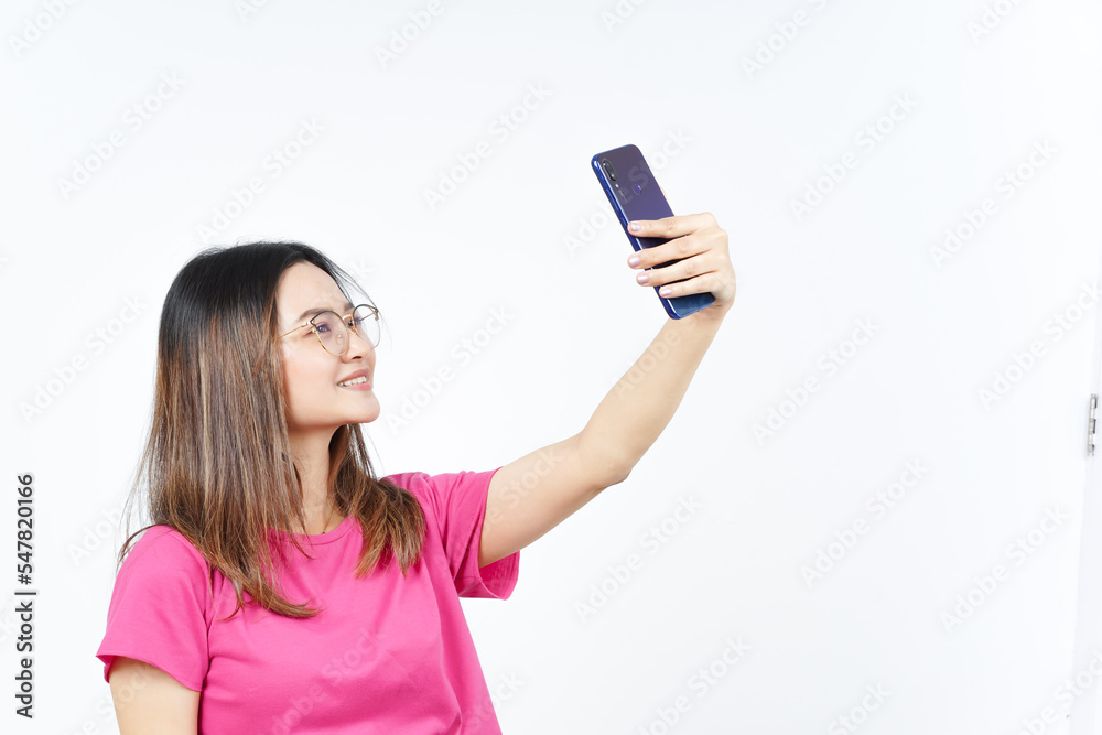 Take a Selfie using Smartphone Of Beautiful Asian Woman Isolated On White Background Take a Selfie using Smartphone Of Beautiful Asian Woman Isolated On White Background