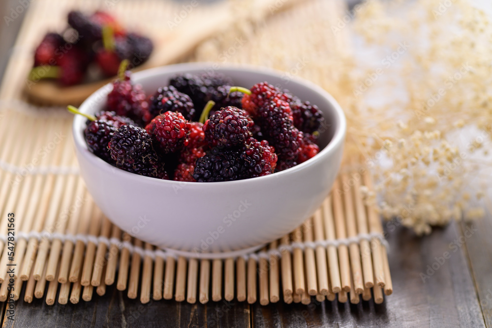 Fresh mulberry fruit in bowl, Healthy organic tropical fruit Fresh mulberry fruit in bowl, Healthy organic tropical fruit