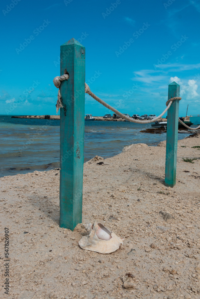 Rope Fence and Conch Shell Overlooking 5 Cays Beach Providenciales Turks and Caicos 