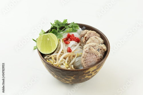 Pho Vietnamse Noodle Soup Famous Food on White Table. photo