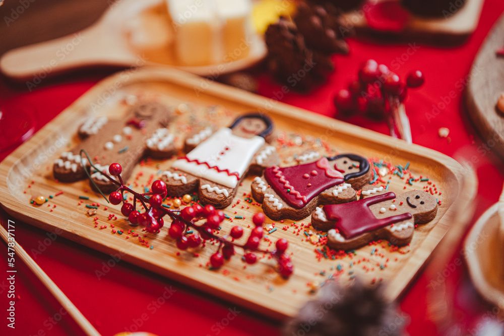 Christmas gingerbread cookies with Christmas decorations on table Christmas gingerbread cookies with Christmas decorations on table