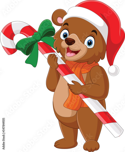 Cartoon bear wearing scarf and hat holding candy cane