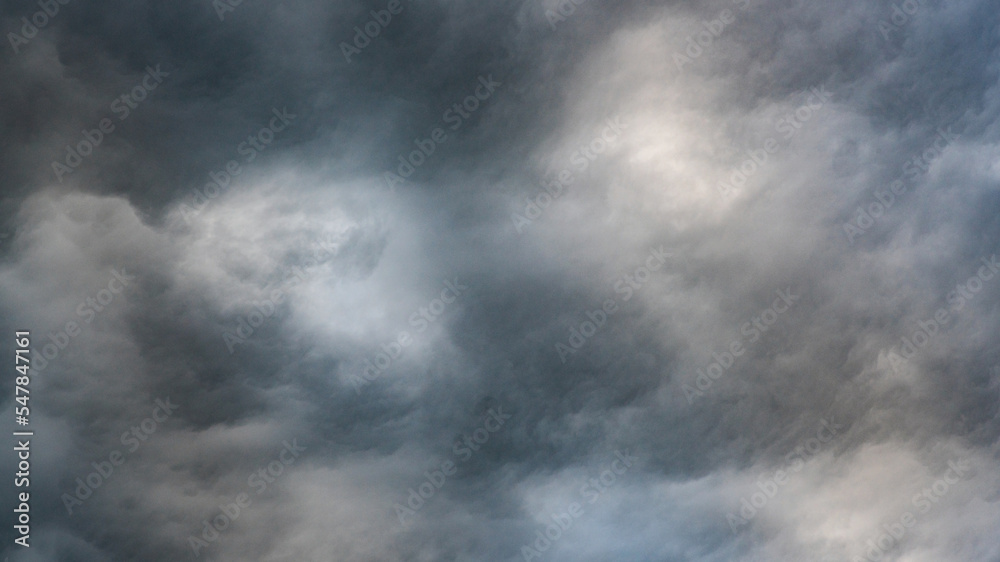 Texture of bright blue dramatic cloudy sky. Texture of bright blue dramatic cloudy sky.