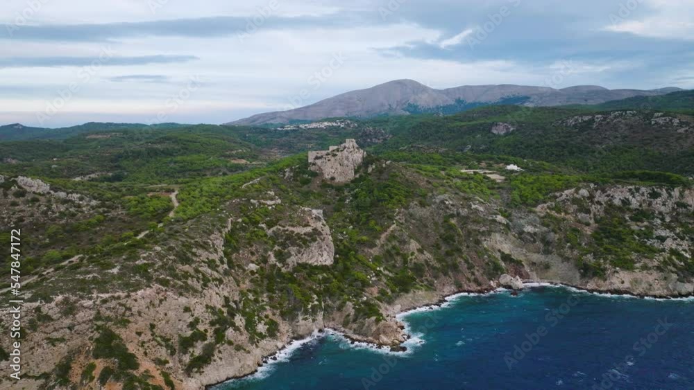 Ruins of medieval Kastellos (Kritinia Castle) on hill above Rhodes coastline Ruins of medieval Kastellos (Kritinia Castle) on hill above Rhodes coastline