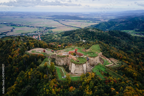 Srebrna Gora fortress and Sudety mountains at autumn season, aerial drone view. Military fort landmark for tourists in Lower Silesia, Poland