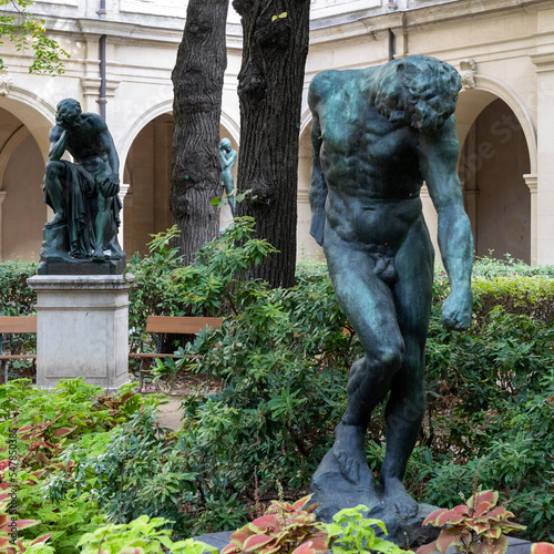 bronze sculpture of a naked man made by the famous Auguste Rodin photo