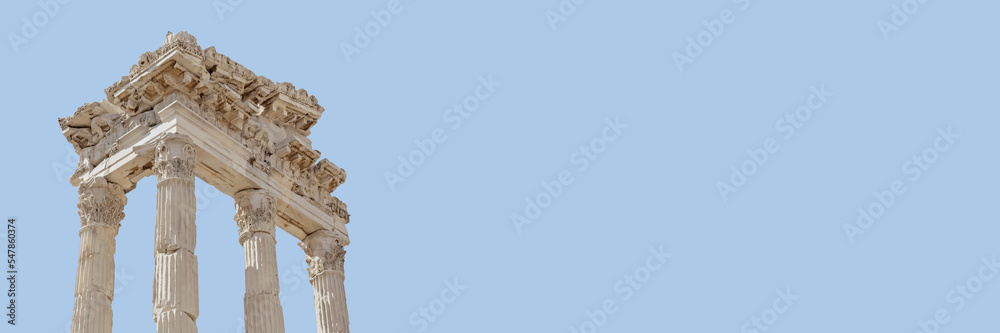 Bergama, Turkey. The Temple of Trajan in Pergamon Ancient City. Close up fragment of the entablature History, art or architecture concept. Isolated, banner, solid color background