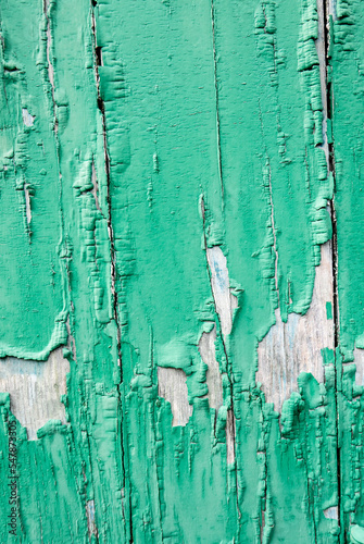 Détail de vieille peinture vert sur du bois
