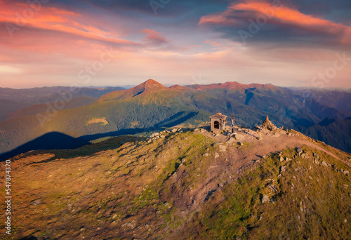 Amazing evening view of popular tourist destination in Carpathian mountains - Petros peak. Exciting sunset in Ukraine, Europe. Beauty of nature concept background..