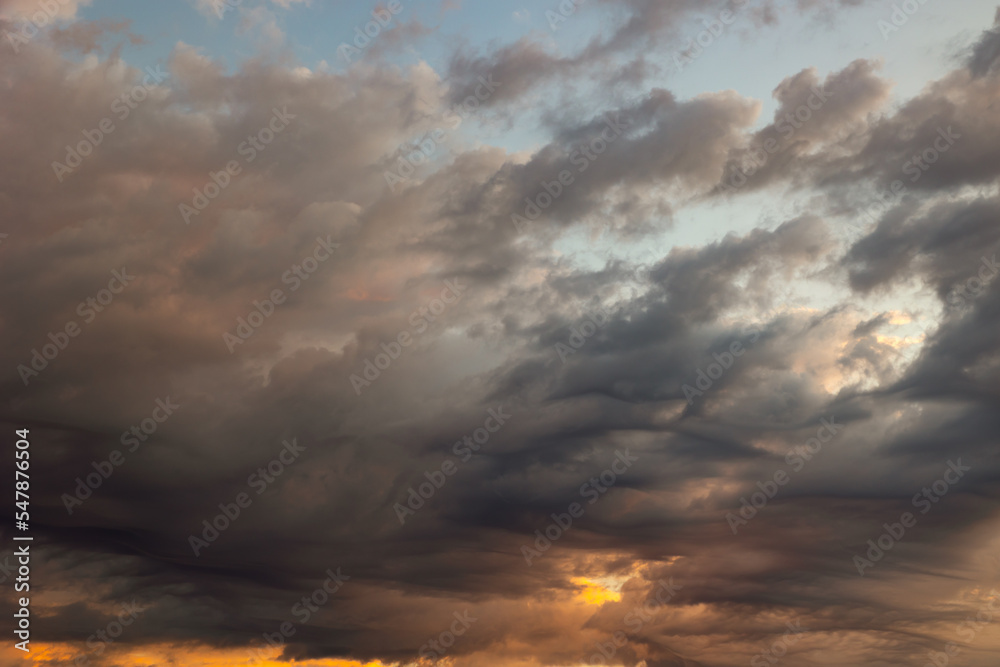 Dramatic or cinematic cloudscape at sunset or sunrise. Cloudy sky