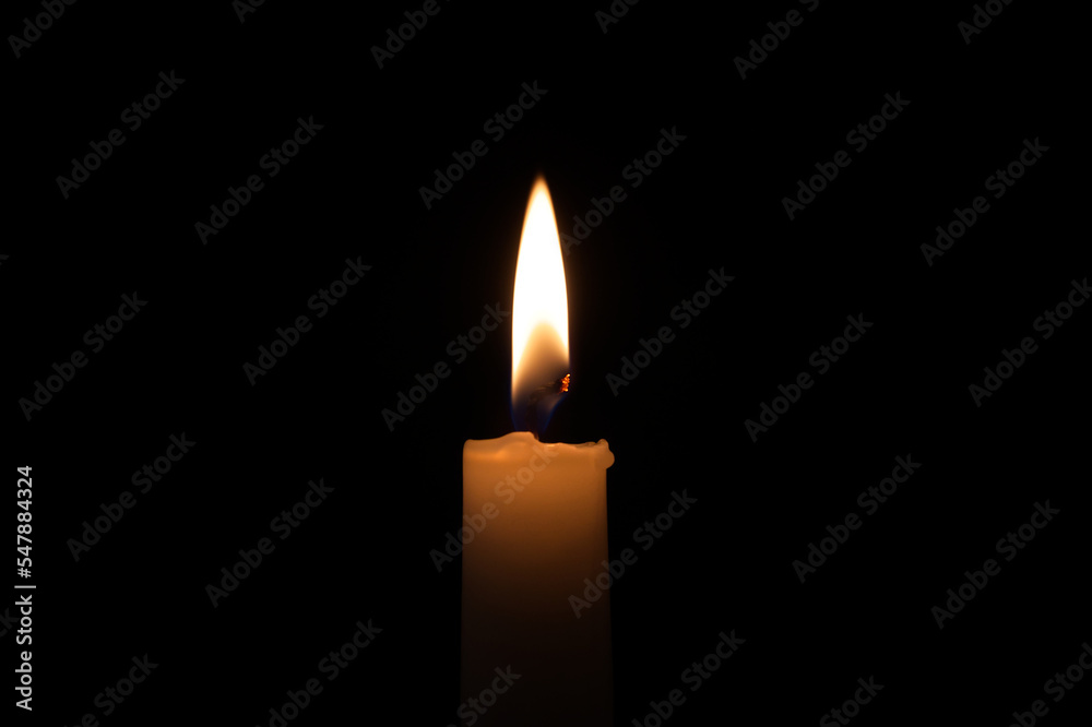 Candle flame against a black background Candle flame against a black background