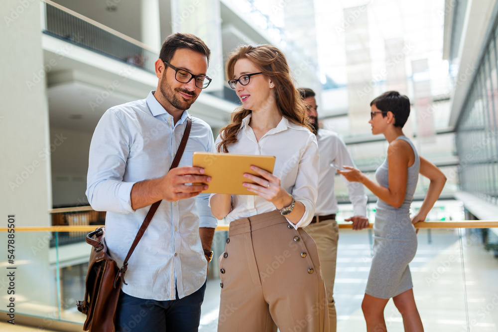 Group of young business people are working together in office. Successful team in coworking. Group of young business people are working together in office. Successful team in coworking.