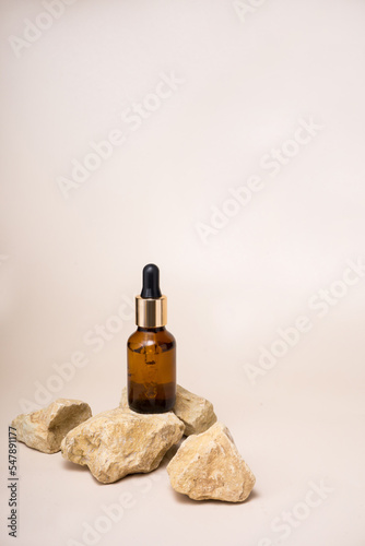 Bottles of dark amber glass with essential oil,