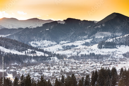 Amazing winter dawn scenery with snowy mountains. Picturesque sunrise and snowy mountain ridge in background, mountains, Carpathians, © dvv1989