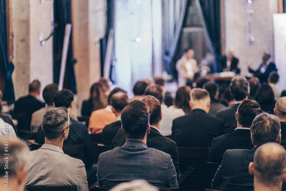 Obraz premium Round table discussion at business convention and Presentation. Audience at the conference hall. Business and entrepreneurship symposium.