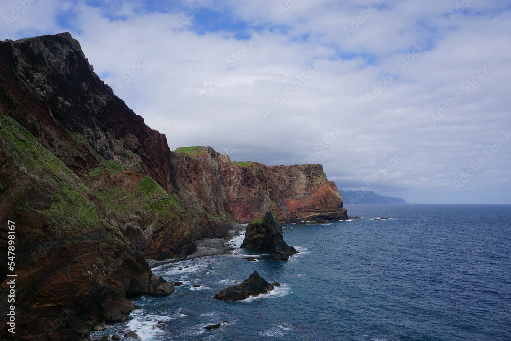 The cliff, reef and sea