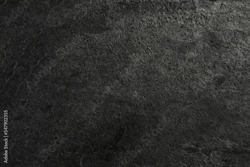 Fotografie, Obraz Texture of dark grey stone surface as background, closeup