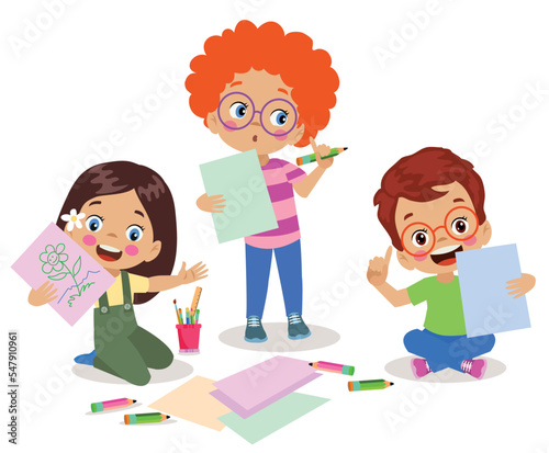 cute boy painting and cutting colorful craft papers