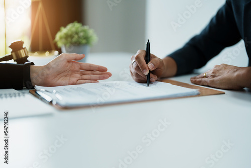 The signing of important documents between the lawyer and the client to enter into an agreement in a court case