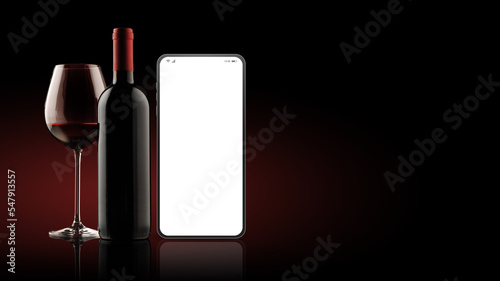 Wine app on smartphone, bottle and wine glass