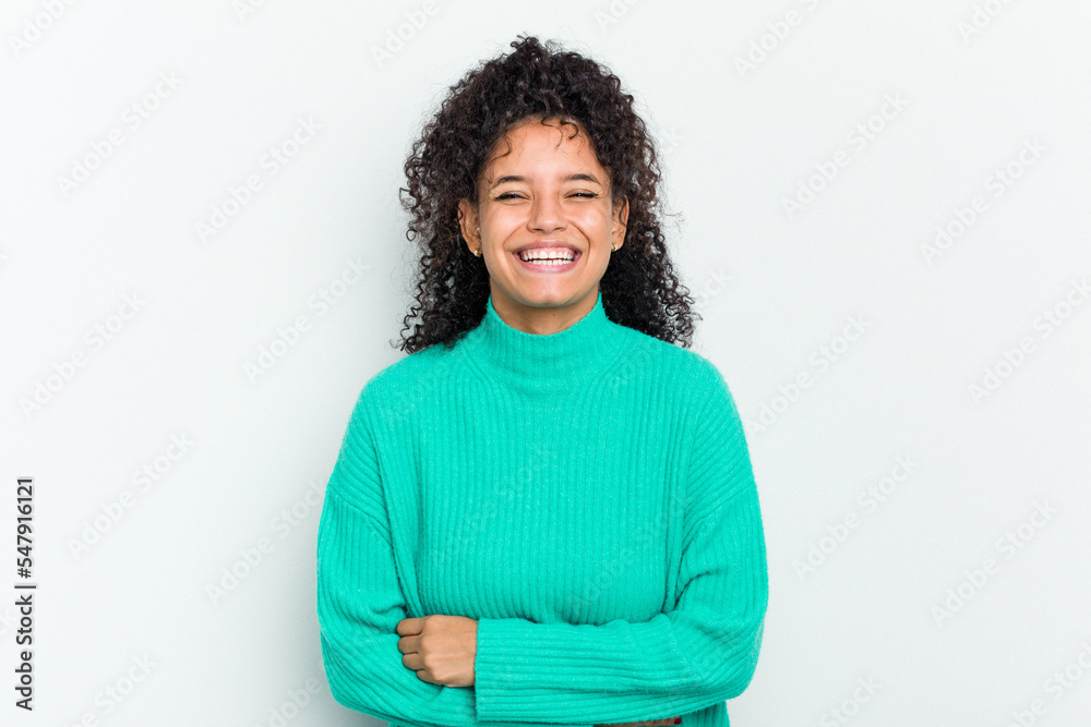 Young african american woman isolated laughing and having fun. Young african american woman isolated laughing and having fun.