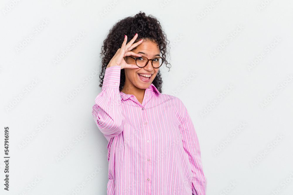 Young african american woman isolated excited keeping ok gesture on eye.
