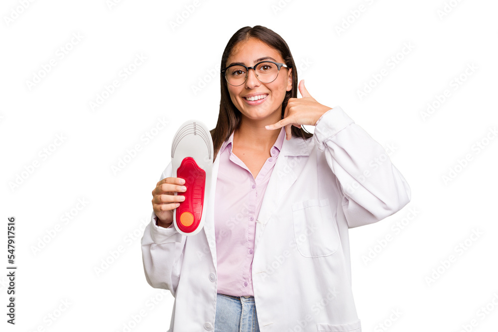 Young caucasian podiatrist woman isolated showing a mobile phone call gesture with fingers. Young caucasian podiatrist woman isolated showing a mobile phone call gesture with fingers.