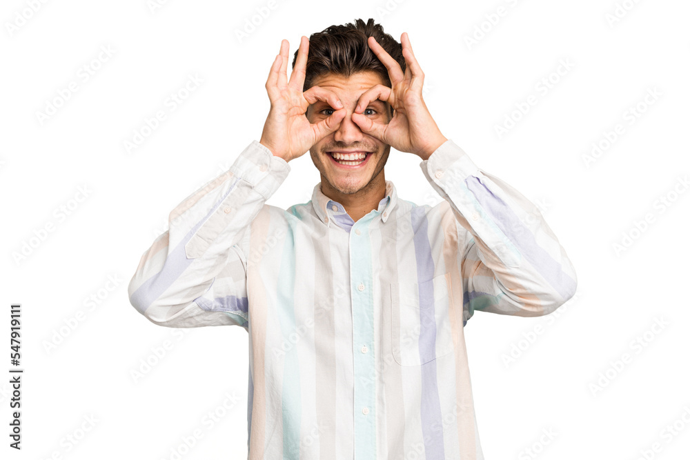 Young caucasian handsome man isolated showing okay sign over eyes